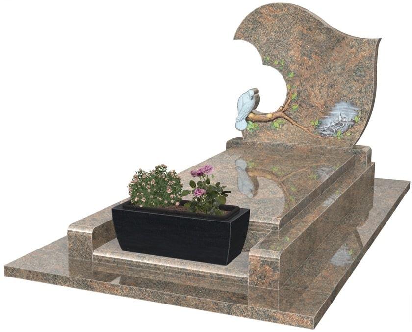 Pierre tombale avec jardinière de fleurs en hiver.jpg