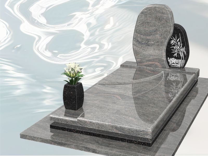 Monument funéraire zen et minimaliste en forme de galet