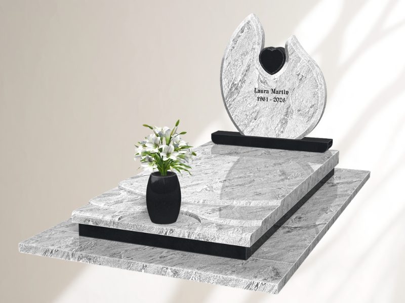 monument funéraire de couleurs claire avec éléments noirs