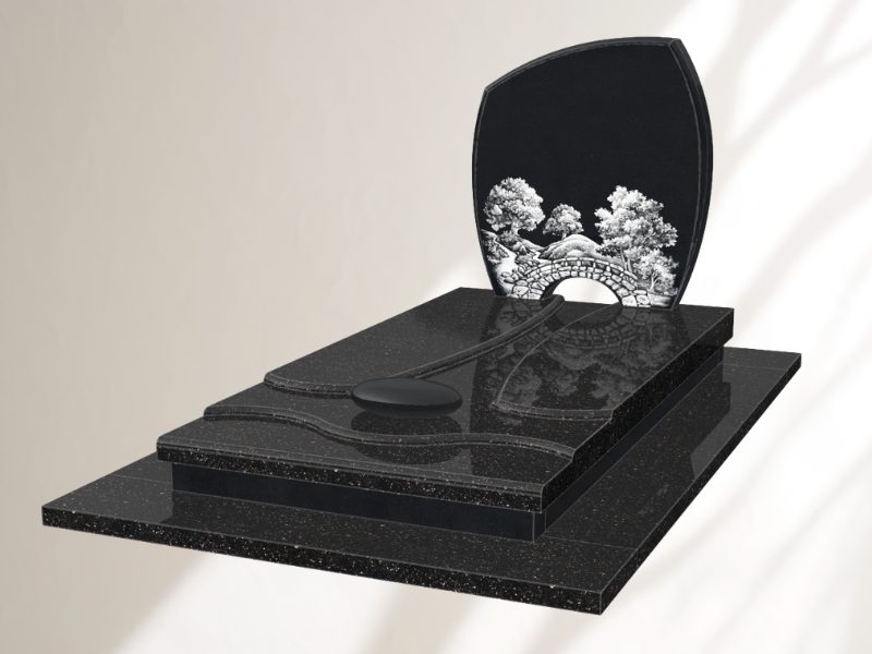 monument funéraire en granit noir avec gravure blanche